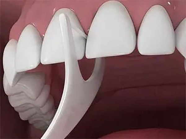 use a dental floss stick